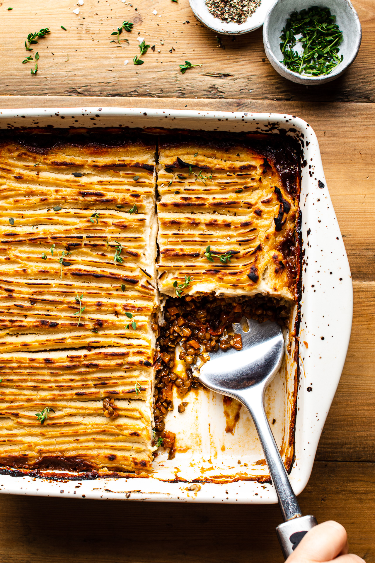 https://www.lazycatkitchen.com/wp-content/uploads/2021/10/celeriac-vegan-sherpherds-pie-plating.jpg